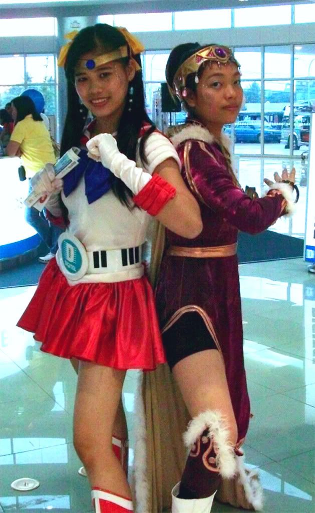 Cosplayers - Sailor Mars and a Sorceress from Cabal